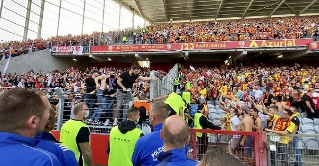 Club Brugge ultras in away stand during Lens-Lille crowd trouble