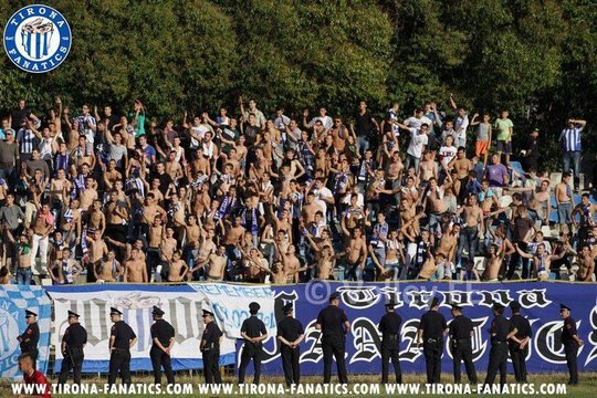 FK Tirana ultras storm pitch and attack officials after late