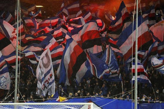 Genoa CFC fans waving flags during the derby soccer match UC Sampdoria vs CFC Genoa, in Genoa Stock Photo - Alamy